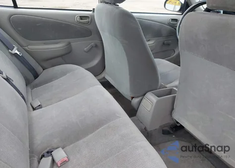 2002 Toyota Corolla Ce из США, поврежденный, VIN 2T1BR12E72C560782